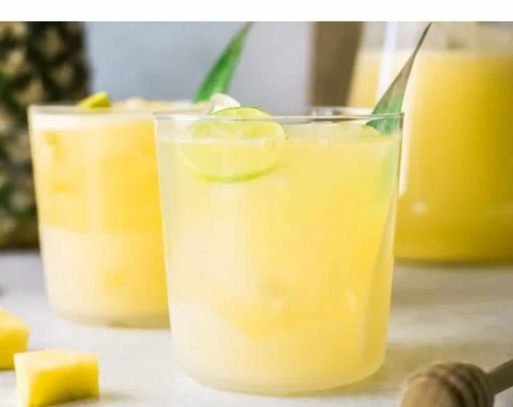 Refreshing glass of pineapple water for hydration