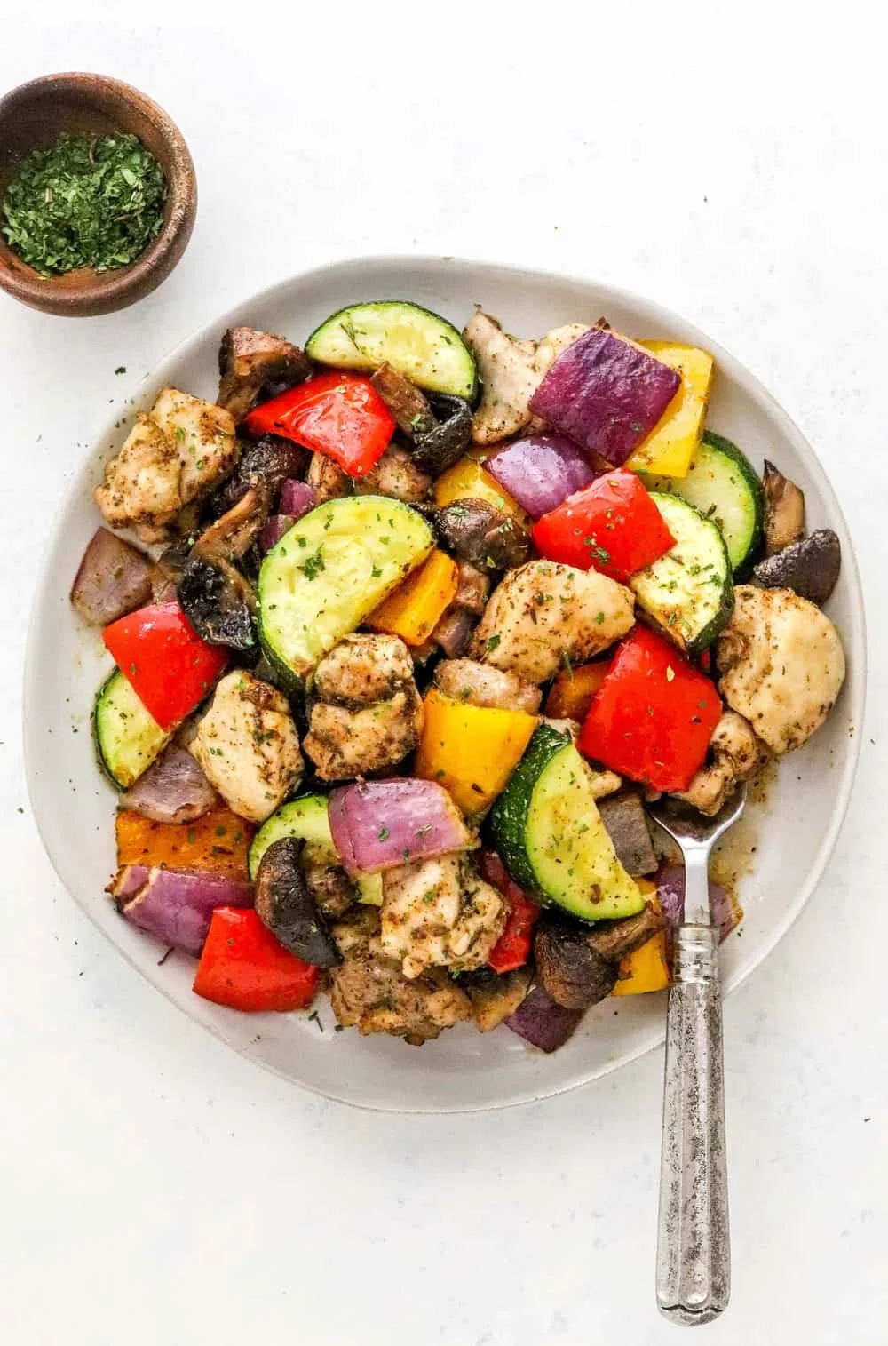 Delicious air fryer roasted chicken with fresh vegetables in a quick meal
