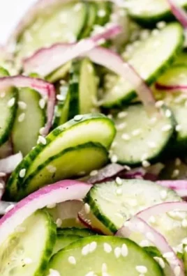 Bowl of delicious Asian cucumber salad with vibrant vegetables