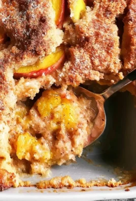 Delicious Bisquick Peach Cobbler served in a dessert dish