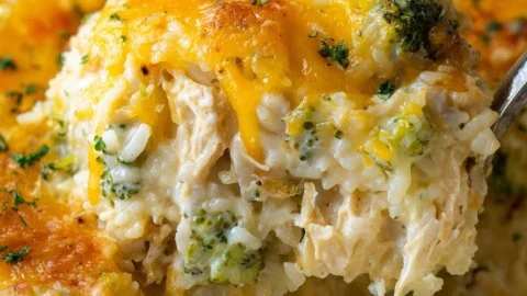 Cheesy broccoli chicken and rice casserole in a baking dish