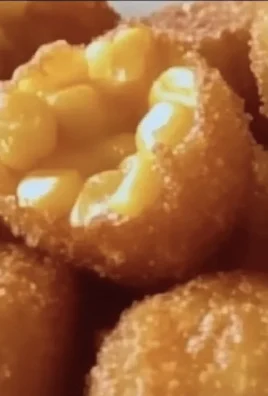 Delicious homemade corn nuggets on a plate ready to be served.