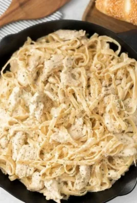 Creamy Chicken Alfredo skillet dinner with pasta and chicken