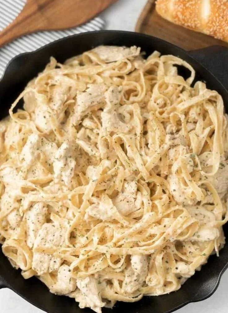 Creamy Chicken Alfredo skillet dinner with pasta and chicken