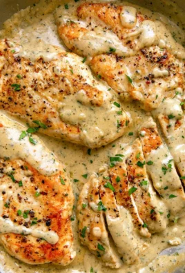 Creamy ranch chicken recipe served on a plate with herbs