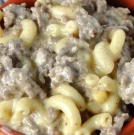 Crock Pot Cheesy Beefy Mac Casserole served in a bowl with cheese and beef