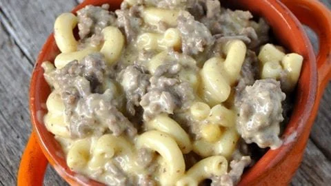Crock Pot Cheesy Beefy Mac Casserole served in a bowl with cheese and beef