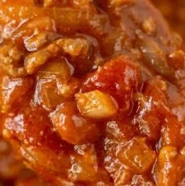 Bowl of easy 5 ingredient chili recipe garnished with herbs
