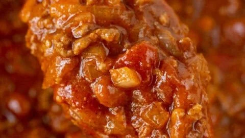 Bowl of easy 5 ingredient chili recipe garnished with herbs