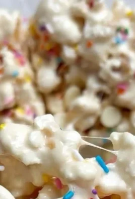 Colorful Funfetti Marshmallow Popcorn Treats on a serving platter