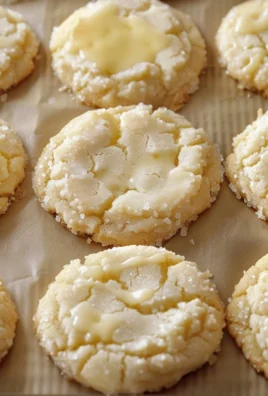Delicious Kentucky Butter Cake Cookies stacked on a plate.