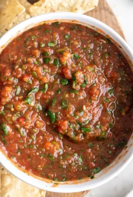 Bowl of homemade restaurant-style salsa with fresh ingredients.