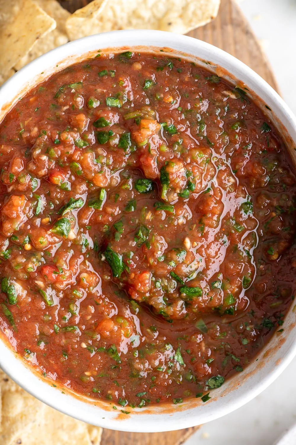 Bowl of homemade restaurant-style salsa with fresh ingredients.