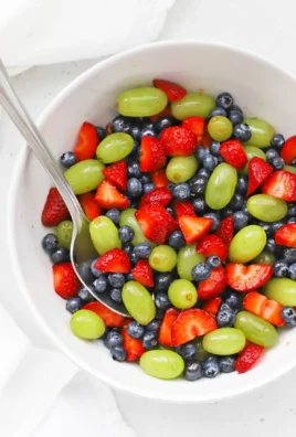 Delicious honey lime fruit salad showcasing fresh fruits in a vibrant bowl.