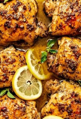 Delicious lemon chicken garnished with herbs