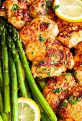 Lemon Garlic Chicken with Asparagus served on a plate