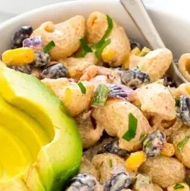 Colorful Mexican Pasta Salad with fresh vegetables and dressing