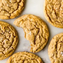 A plate of soft and chewy peanut butter cookies ready to be enjoyed.