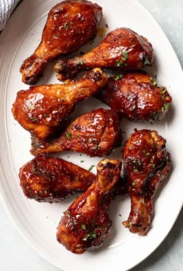 Juicy and tender oven baked chicken legs seasoned and ready to serve.