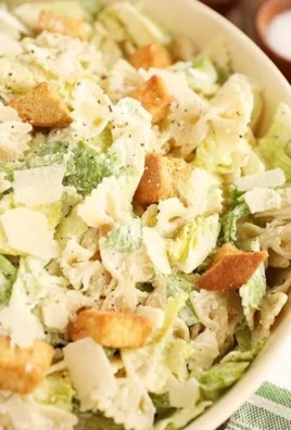 Pasta Caesar Salad with fresh greens and creamy dressing