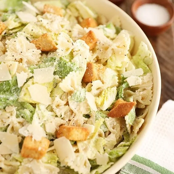 Pasta Caesar Salad with fresh greens and creamy dressing