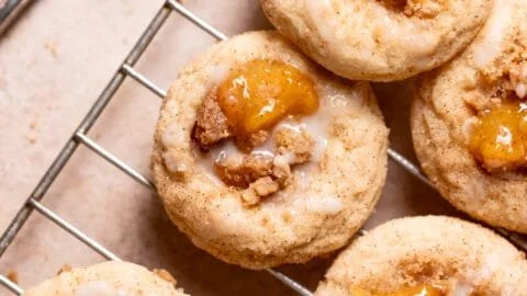 Freshly baked Peach Cobbler Cookies on a rustic wooden table