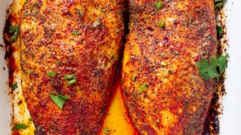 Juicy and tender perfect oven baked chicken breast on a plate