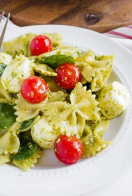 Pesto Caprese Pasta Salad with fresh tomatoes and mozzarella cheese