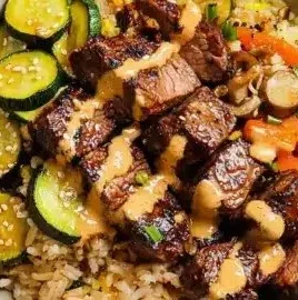 Delicious Hibachi Steak Bowls served with vegetables and rice