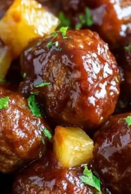 Slow cooker pineapple barbecue meatballs served on a platter.
