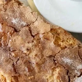 Delicious slice of Snickerdoodle Zucchini Bread fresh out of the oven
