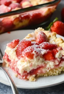 Delicious Strawberry Cheesecake Dump Cake with fresh strawberries and cream cheese