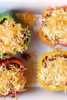 Colorful stuffed bell peppers filled with savory ingredients for a healthy meal