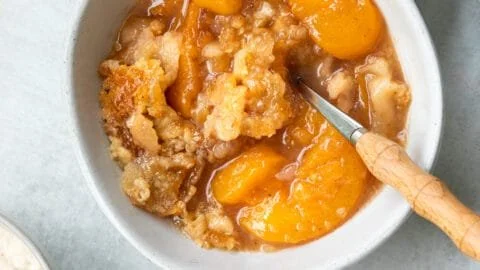 Easiest Southern peach cobbler with fresh peaches and golden crust.